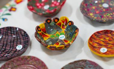 artwork from artisan vendor booth at market