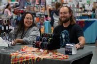 vendors smiling at artisan market