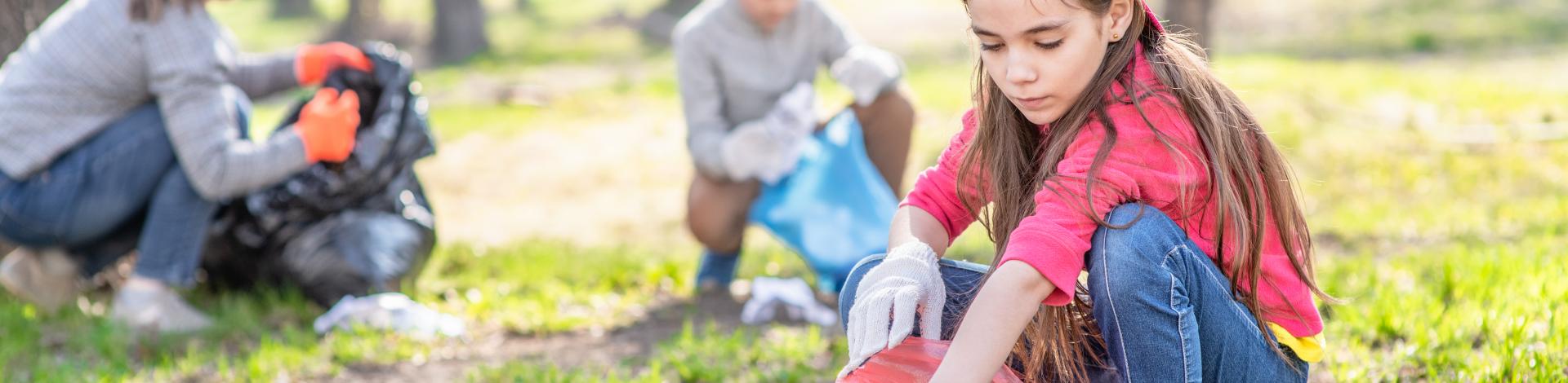 picking up garbage in park