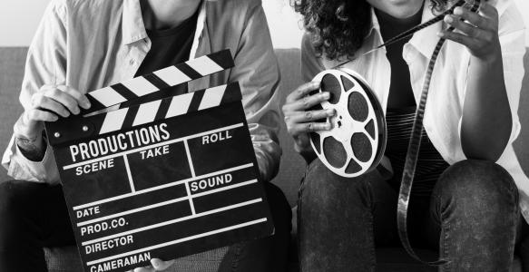 young-women-with-movie-film-reel