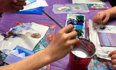 many hands painting