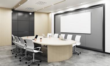 bright conference room with table and chairs