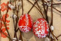 Red Easter eggs decorated with white lines. 